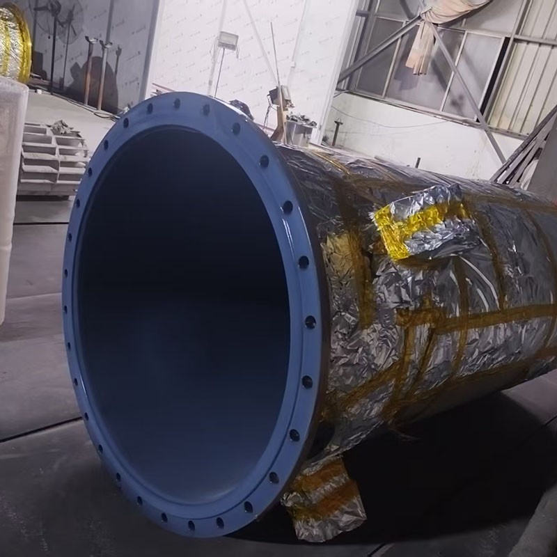 Récipient récepteur intermédiaire de produits chimiques enduit de PFA